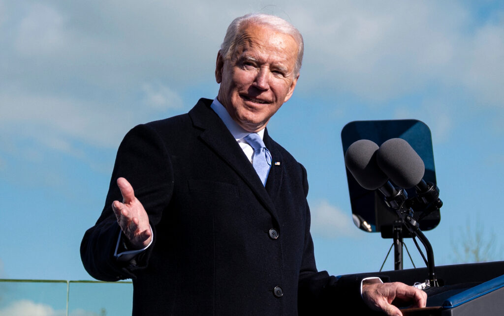 fashion elements to channel the power style of American President Joe Biden, including suits, denim, socks and sunglasses