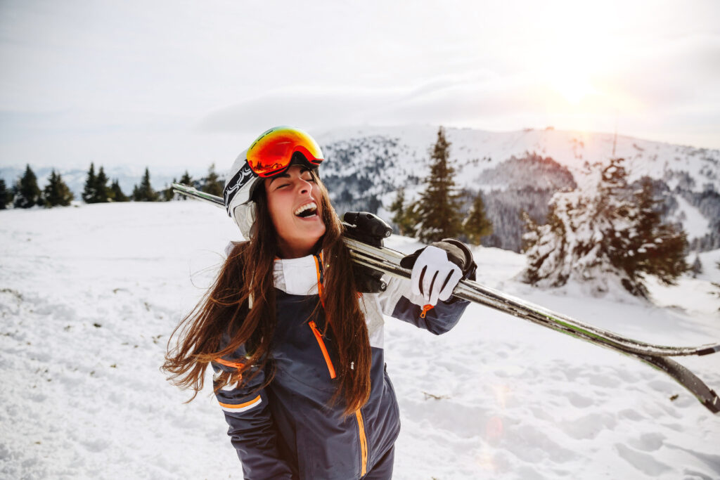 top trends and best new luxury fashion looks for women in performance ski wear for the winter of 2021-22, including ski suits, jackets, base layers and more