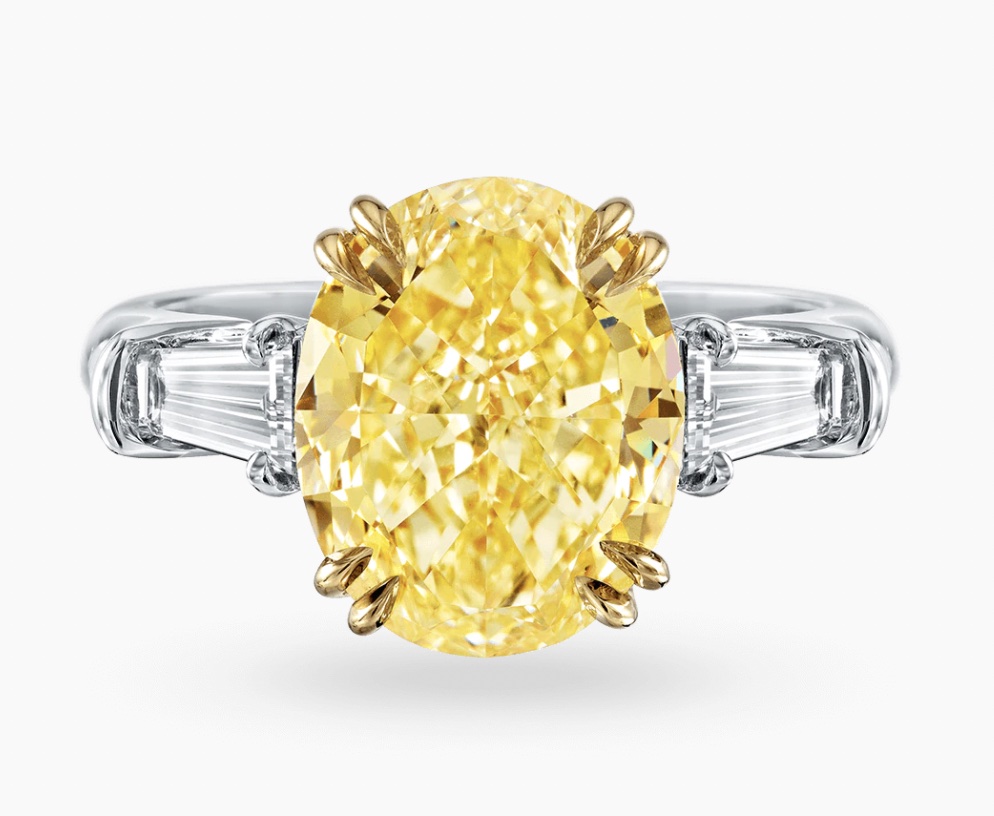https://www.harrywinston.com/en/products/classic-winston/classic-winston-oval-shaped-yellow-diamond-ring-rgyedmov040tb
