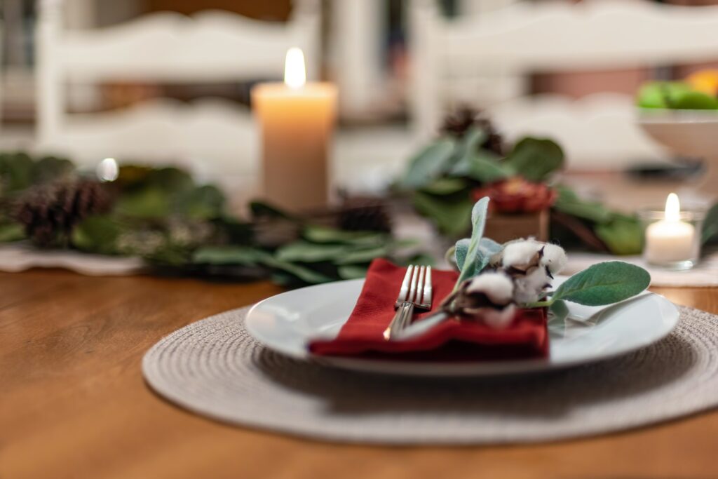 How to set a luxury dining table for Christmas at home this holiday 2021 with elegant tabletop pieces like plates, silverware and more