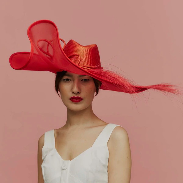The best bespoke hat shops and world famous milliners for women in New York, London, and Paris to find special occassion luxury millinery.