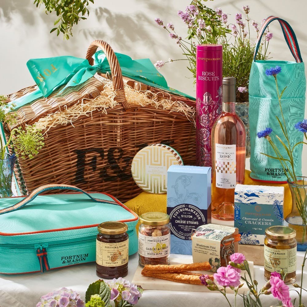 The luxury essentials to pack for the perfect picnic this season, including the best baskets, gourmet foods, drinks, blankets, and fashion.