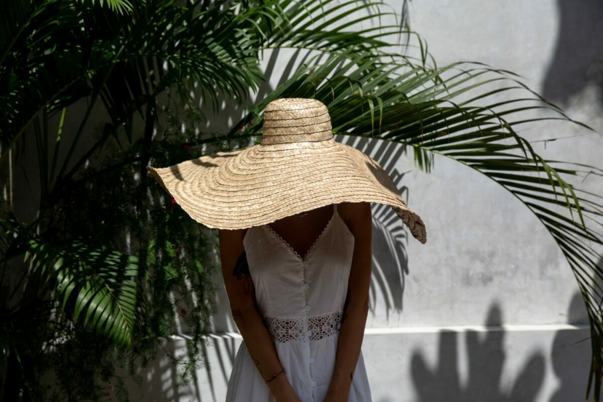 the best luxury designer sun hats for cool glamour on hot summer days, including bucket, baseball cap, visor, straw or oversized wide-brim