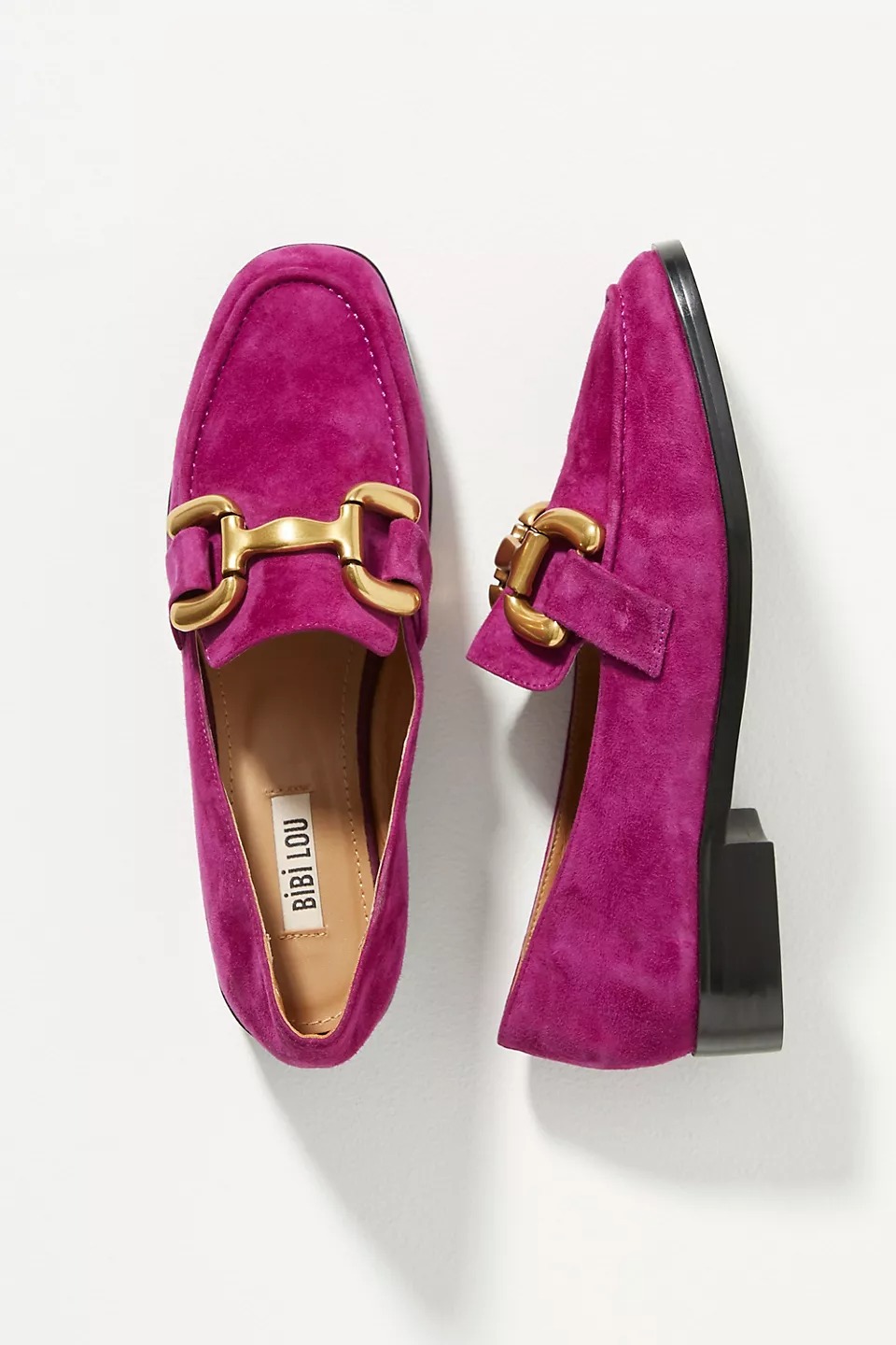 Best loafers for women from luxury designer fashion brands like Gucci, including chunky and classic styles perfect for fall 2022.