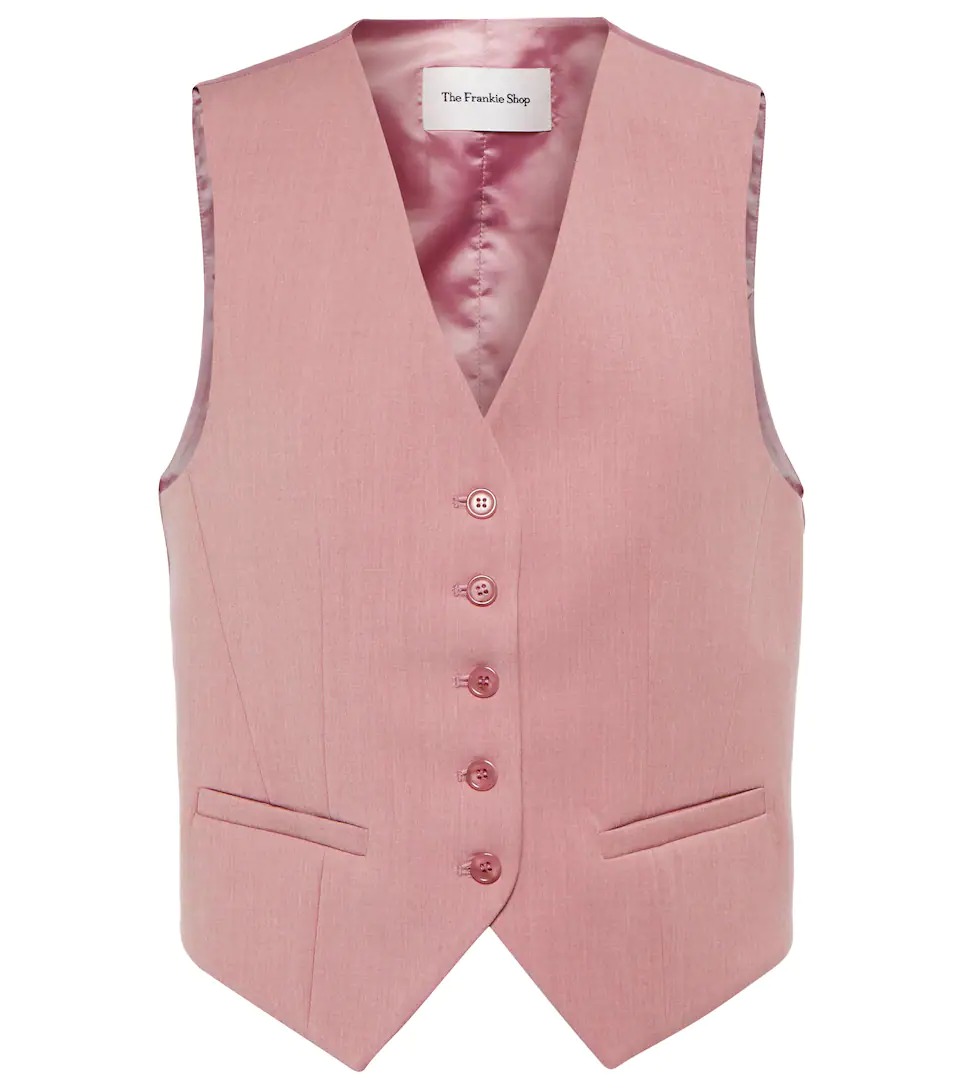 Suit vests and waistcoats for women from luxury designers, including boxy and classic cuts, and fashion versions in linen and corduroy.