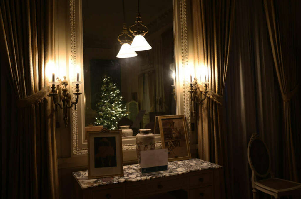 A Christmas holiday tour with our best photos of the Breakers mansion in Newport, Rhode Island decorated with lights and trees inside and out.