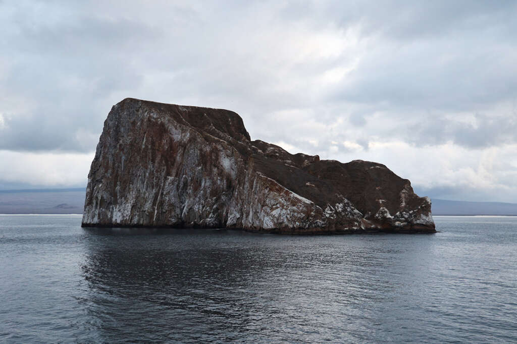 photos of Kicker Rock in the Galapagos Islands at sunset. 