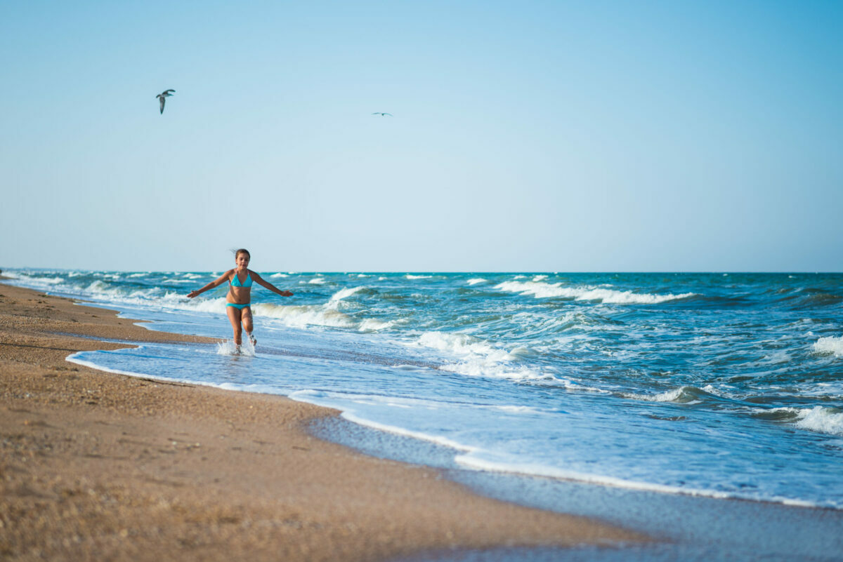 The luxury essentials and chic accessories best for the beach this Summer 2023, including umbrellas, chairs, coolers, games, and more.