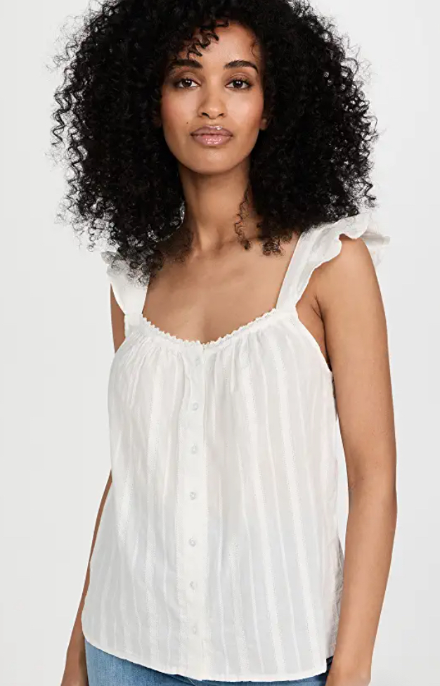Best luxury designer white tank tops for women to channel the big fashion trend of summer 2023, including Balmain, Saint Laurent and more.