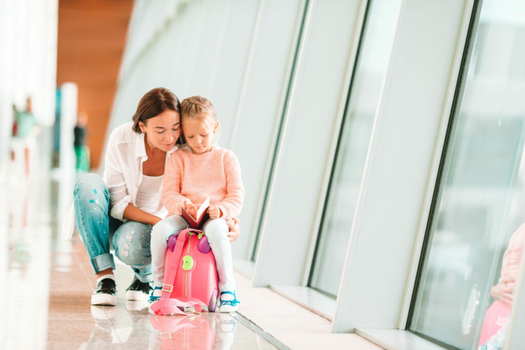 The best 12 essential items to make traveling this Summer with kids a breeze that are not only practical but stylish too.
