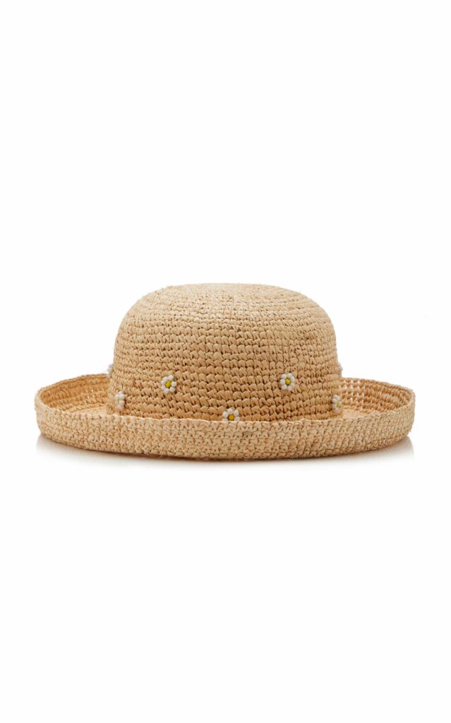 12 luxury designer sun hats to stay cool yet glamorous this Summer including different styles such as a bucket, a baseball cap, or a visor.