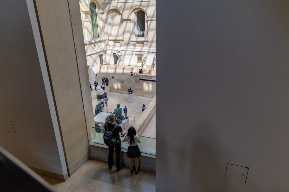 father and daughter looking over museum sculpture hall — father-daughter relationship in literature, books of nonfiction and fiction